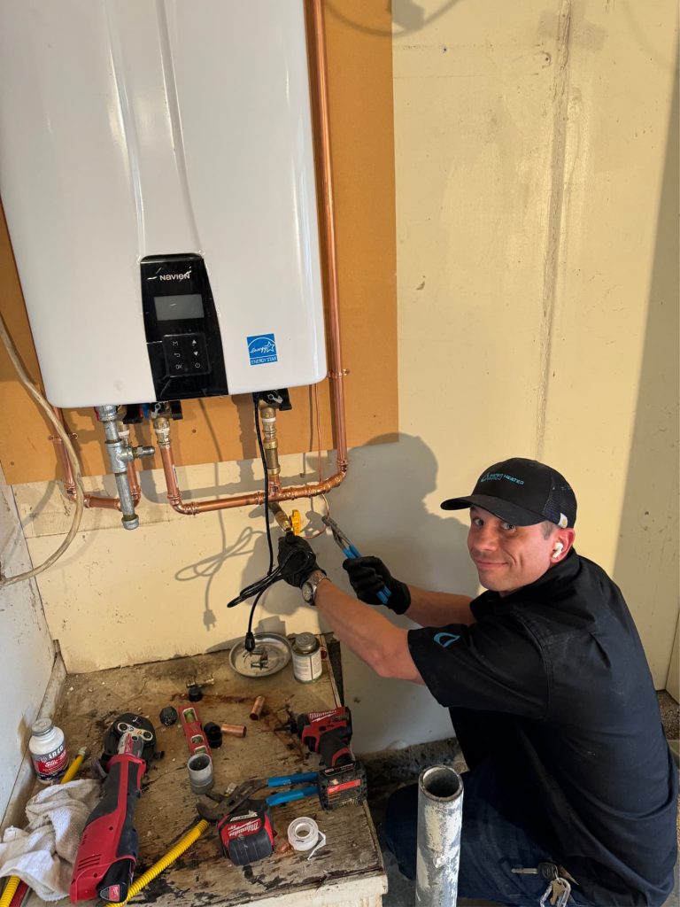 Professional Plumber Installing Tankless Water Heater